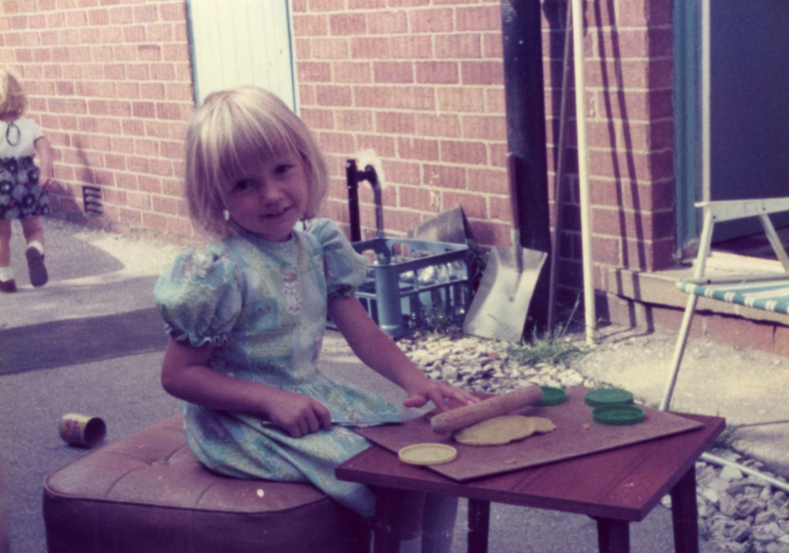 Photo of Anna Aspnes creating art at an early age.